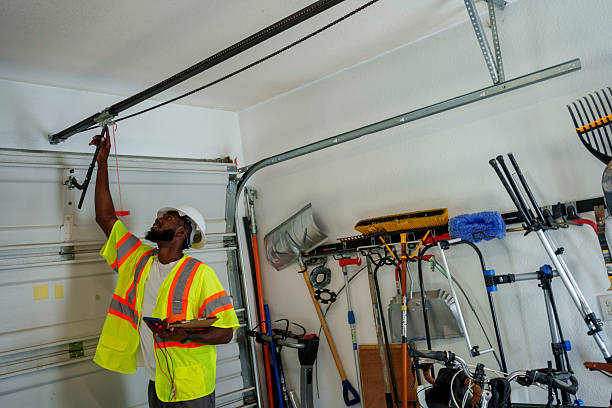 Professional Garage Door Panel Replacement technician working in Sherrill, NY